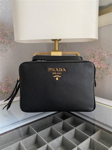 prada bandoliera in pelle|Prada cahier bag.